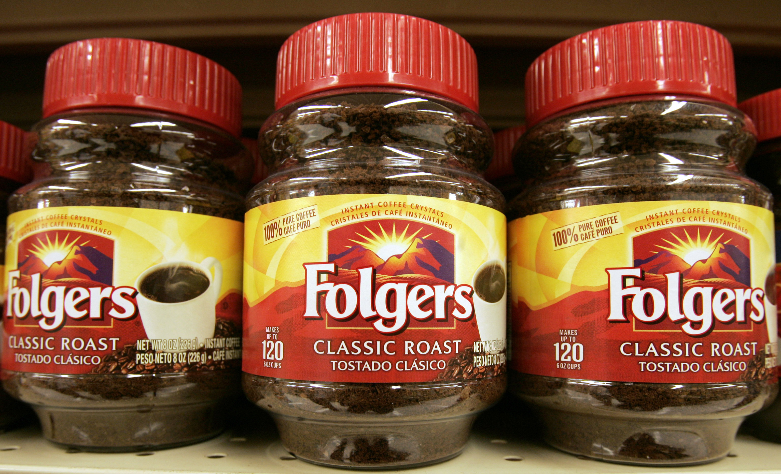 In this June 4, 2008 photo, containers of Folgers instant coffee are seen on a supermarket shelf in Norwood, Mass. (AP Photo/Steven Senne, file)